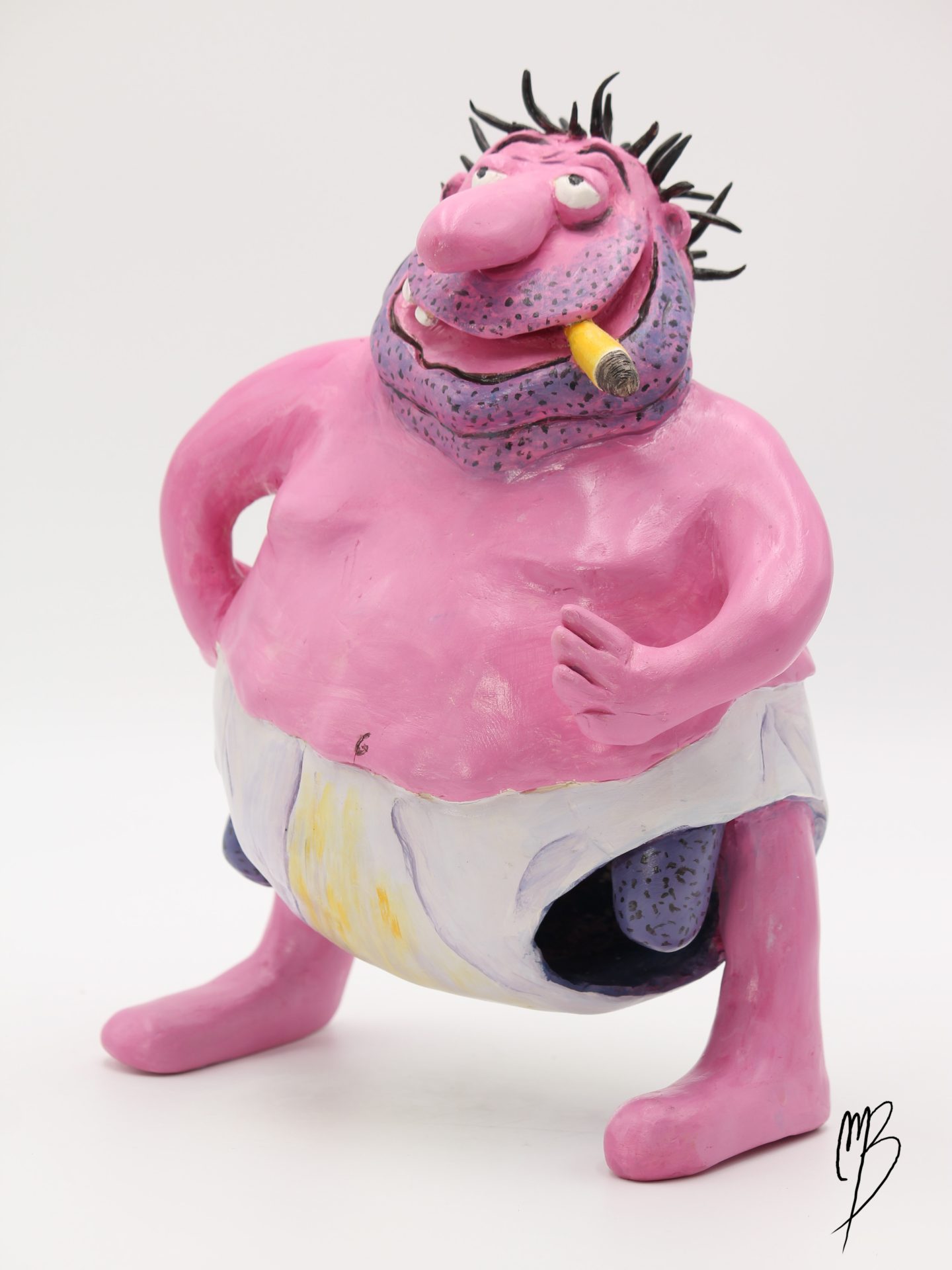 Bande dessinée. Gros Dégueulasse en caleçon debout campé sur ses pieds en terre cuite recouverte de peinture acrylique vernie